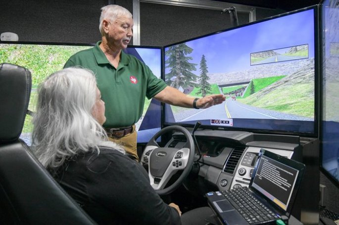 Person using a driving simulator