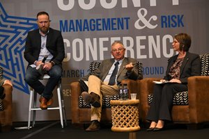 TAC Risk Management Services Director Michael Shannon moderating a conference panel