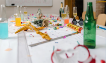 Table with drink bottles and confetti