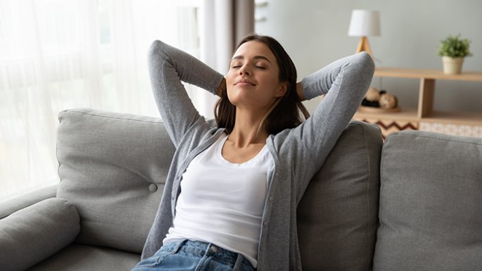 Woman relaxing on couch