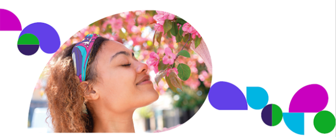 Woman smelling flowers